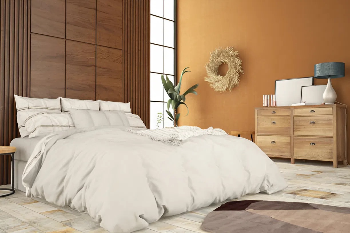Bedroom featuring a bold fall-colored statement wall designed by an interior painter in Webster, TX